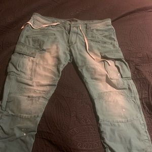 Distressed paint spatter AKOO jeans